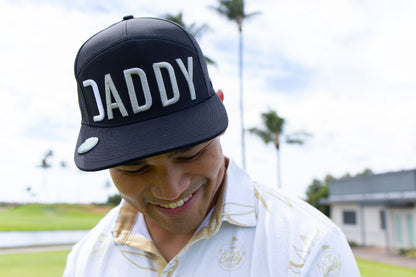 Black 7 panel “Caddy-Daddy” embroidered  logo