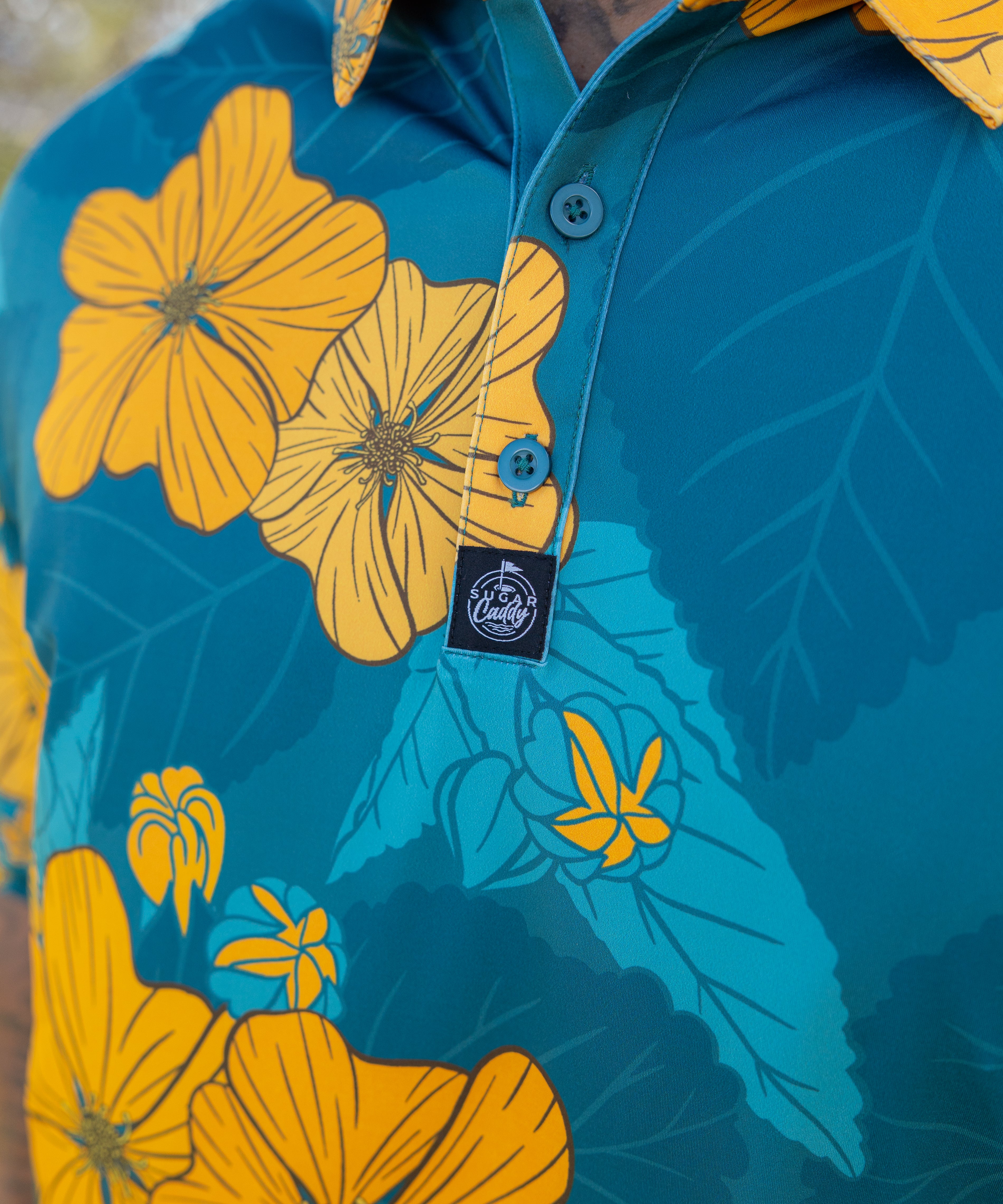 Close view of Sugar Caddy 'Ilima golf polo