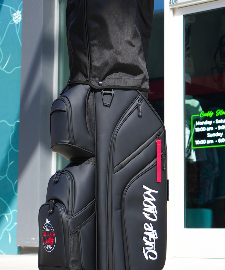 Black golf stand bag with red and white embroidery